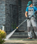 Person using pressure washer with Five Pack Pressure Washer Nozzle Tips With 1 Quarter Inch Quick Connect, Handles Up To 4000 PSI And 2.5 GPM on patio