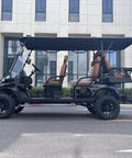 Hella Comfy 6 Seater Electric Golf Cart With Roof LED Light Bar showcasing diamond stitched leather seats and sleek headlights.