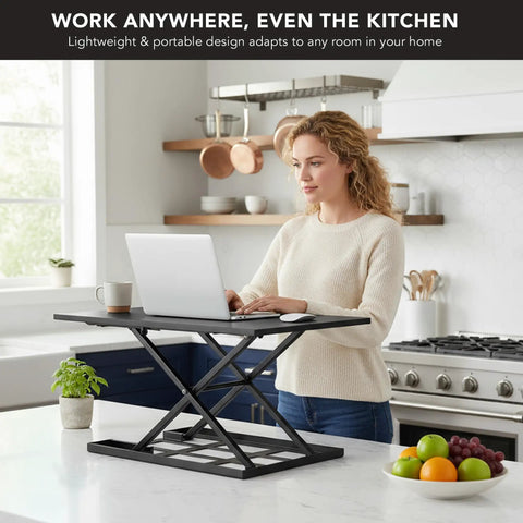 32 By 22 Inch Standing Desk Converter With Gas Spring Lift Slim Two And A Half Inch Low Profile Sit Stand Desk Riser Ergonomic Height Adjustable Desktop Workstation for Home And Office in a kitchen setup.