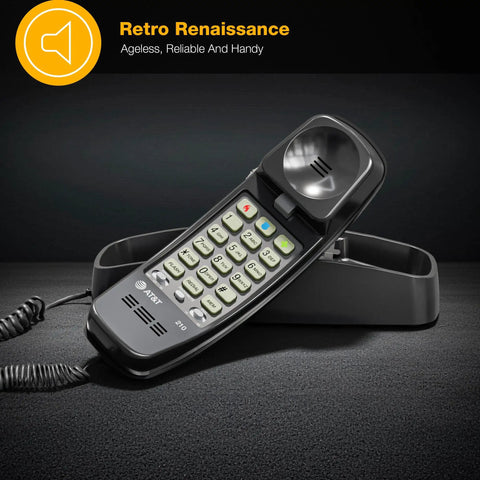 Straight Up Reliable Trimline Corded Landline Phone Works Like A Dream With Bright Backlit Keypad on a black background.