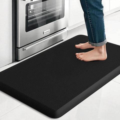 Kitchen Mat Cushy Thick Floor Comfort Mat With Non Slip Bottom Water And Stain Resistant Easy Clean Standing Desk Mat For Kitchen Sink And Office 17.3x28 Inches Black in use by kitchen sink