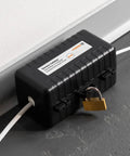 Indoor Plug Safe Box With Lockable Safe Compartment Measures 120 X 60 X 60 mm IP20 For Cables Up To 18 mm Thick Includes Padlock And Keys Guard Against Unauthorized Use Of Euro And Schuko Plugs installed against wall