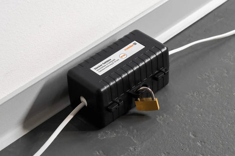 Indoor Plug Safe Box With Lockable Safe Compartment Measures 120 X 60 X 60 mm IP20 For Cables Up To 18 mm Thick Includes Padlock And Keys Guard Against Unauthorized Use Of Euro And Schuko Plugs installed against wall