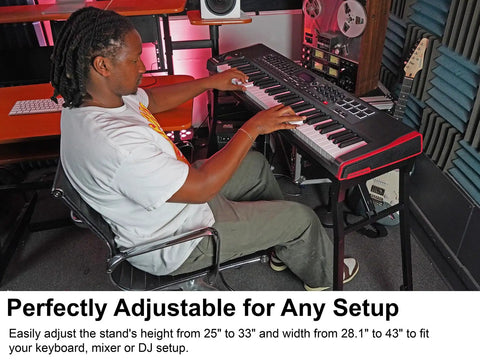 Person using Adjustable Platform Keyboard Stand for Live Gigs and Studio Use, steel with foam pads, height 25-33 in, width 28.1-43 in.