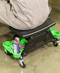 Heavy Duty Rolling Workbench And Creeper Seat For Auto Repair, A Garage Must Have Mechanics Stool With Wheels, No Tip Stability, Green And Black, 300 Lb Capacity, Great For DIYers And Pros with person seated showing storage trays