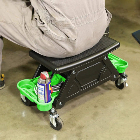 Heavy Duty Rolling Workbench And Creeper Seat For Auto Repair, A Garage Must Have Mechanics Stool With Wheels, No Tip Stability, Green And Black, 300 Lb Capacity, Great For DIYers And Pros with person seated showing storage trays