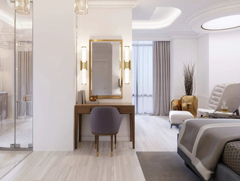 Modern bedroom with vanity featuring Caper 24 Inch LED Vanity Light In Brushed Brass With Frosted Lens Dimmable Hardwired Fixture
