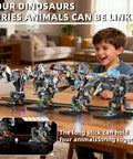 Child playing with four linked mechanical dinosaur kits on a table, demonstrating the Mechanical T Rex Building Kit With Lights.