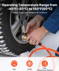 Heavy Duty 1/2 Inch By 100 Foot Air Compressor Hose With Solid Brass Fittings connected to tire in snow.