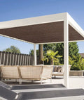 Brown 5x7 Sun Shade Sail Rectangular UV Blocking Outdoor Canopy installed over a patio seating area with white frame and greenery background
