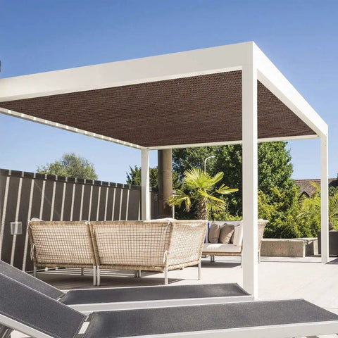 Brown 5x7 Sun Shade Sail Rectangular UV Blocking Outdoor Canopy installed over a patio seating area with white frame and greenery background
