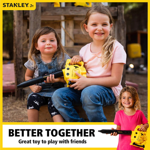 Two kids playing with Red Toolbox Junior Battery Operated Blower Toy For Kids With Realistic Sound And Action, outdoors.