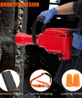Heavy Duty Concrete Breaker Jack Hammer With 1700W Demo Power And Three Piece Chisel Bit Kit in action on concrete wall.