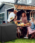 Outdoor Dining Cart Cover With Split Zipper, Waterproof 40 By 24 By 32 Inches, shown on a dining cart next to a group gathering in a garden