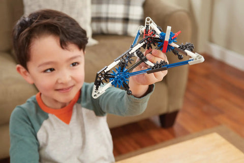 Child playing with Stealth Plane Building Set With 60 Pieces For Ages Five And Up A Kid Friendly Hands On STEM Toy For Creative Flight Missions