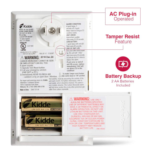 Back view of Plug In Carbon Monoxide Detector With Battery Backup, 85 DB Alarm, showing AC plug, tamper resist, and battery compartment.