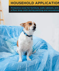 Dog sitting on furniture covered with Blue Protective Masking Film Cover For Painting Projects Overspray Shield Paintable Plastic Sheeting Roll 20 Feet By 250 Feet 10 Micron Thin Electrostatic Cling Auto And Home Painting Protection For DIYers.
