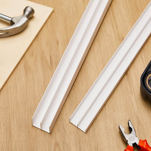 Two Pack Heavy Duty Four Foot Long Plastic Sliding Cabinet Door Track Hardware Sets For Half Inch Thick Panels Includes Upper And Lower Tracks For Sliding Closet Doors And Glass Window Cabinets Easy Quick Installation on a wooden table with tools