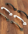 Set of four Vintage 85mm Drawer Knob Set For Cabinets And Dressers, various finishes on wooden handles on wooden surface