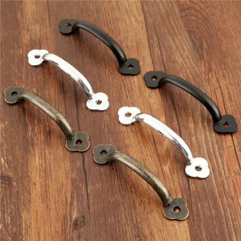Set of four Vintage 85mm Drawer Knob Set For Cabinets And Dressers, various finishes on wooden handles on wooden surface