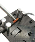 Close-up of Must Have Carbon Fiber Welding Jig Wire Station With Pocket Hole For XT60 XT90 Connectors Soldering Clamp Craft Tool