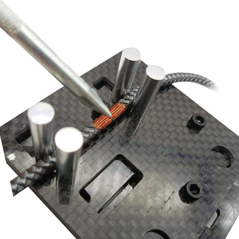 Close-up of Must Have Carbon Fiber Welding Jig Wire Station With Pocket Hole For XT60 XT90 Connectors Soldering Clamp Craft Tool