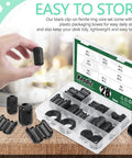 Hand holding Clip-On Ferrite Ring Core EMI RFI Noise Suppressor Kit, 32-Piece Cable Clip Set for organizing cables