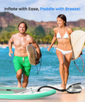 Couple on beach with surfboards near electric inflatable paddle board pump 12V car connector 3.3 ft hose for SUPs boats rafts.
