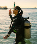 Scuba diver wearing Liberator BCD With AWLS III And RiteTite Harness for boss level tank stability and smooth buoyancy control.