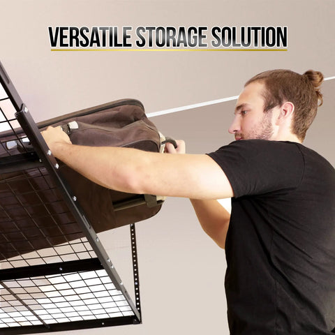 Man placing a bag on Overhead Garage Shelving Storage Rack Adjustable 3 ft by 6 ft Ceiling Organizer Shelf Space Saving Heavy Duty