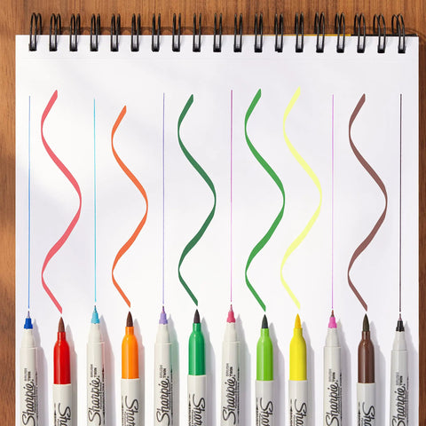 Dual Tip Permanent Markers With Brush And Ultra Fine Tips, Assorted Colors, 12 Count on paper showing colorful strokes.
