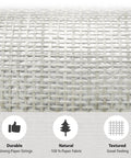 Close-up of Cosmo Collection Natural Paper Weave Grasscloth Wallcovering, textured paper fabric in dim grey ivory.