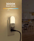 4 Pack Plug In Motion Sensor Night Light With 3000K Warm White illuminating a kitchen scene