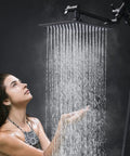 Woman enjoying the All Metal 8 Inch Dual Square Shower Head With Handheld Combo, rain shower with oil rubbed bronze finish.