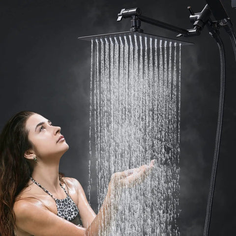 Woman enjoying the All Metal 8 Inch Dual Square Shower Head With Handheld Combo, rain shower with oil rubbed bronze finish.