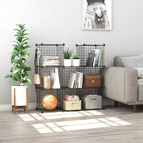 8 Cube Wire Grid Storage Organizer Dope Modular Shelving System in black, displaying books and decor beside a gray sofa in living room.
