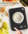 Top view of Smart Food Scale With Nutritional Calculator Waterproof LED Display Digital Kitchen Scale holding a bowl of flour
