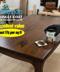 Game Changing One Coat Interior Wood Oil Finish With Fast Fix Accelerator And Zero Voc Friendly Formula For Lazy Weekend Projects And Snazzy Oak Floor Refreshes In Your Dream Space applied to a wooden table with a can of oil.