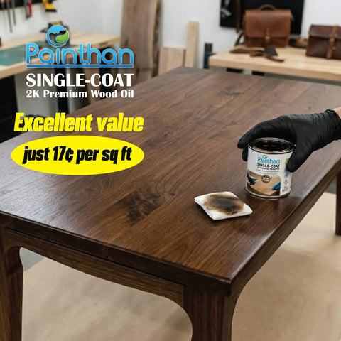 Game Changing One Coat Interior Wood Oil Finish With Fast Fix Accelerator And Zero Voc Friendly Formula For Lazy Weekend Projects And Snazzy Oak Floor Refreshes In Your Dream Space applied to a wooden table with a can of oil.