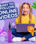 Girl with laptop surrounded by balloon animals and pump, showcasing Balloon Animal Kit For Beginners With Pump And Manual 120 Pieces Create 30 Plus Fun Balloon Sculptures Easy Twist And Model Party Activity For Teens Boys And Girls Ideal Gift For Parties And Kids.