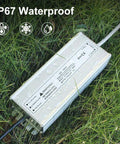 All Weather 100W 12V DC LED Driver Power Supply IP67 Waterproof Outdoor Transformer on grass with raindrops