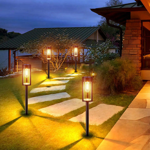 Solar Pathway Lights 6 Pack IP65 Waterproof Outdoor Decorative Garden Lights With Auto On Off illuminating a walkway at dusk