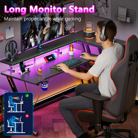 40 Inch L Shaped Gaming Desk With Power Outlet And LED Lights Carbon Fiber Textured Corner Computer Desk setup with user