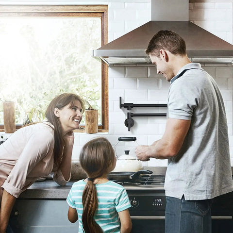 Slick Matte Black Brass Pot Filler Faucet Rock Solid Wall Mount Kitchen Cooktop Tap With Dual Swing Arms And 360 Degree Rotation in use with family.
