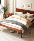 Rock Solid Mid Century Modern Full Size Wood Platform Bed With Reinforced Slat Support And Roomy 16 Inch Under Bed Storage No Box Spring Needed For Hassle Free Assembly In Classic Walnut Finish in a well-decorated bedroom.