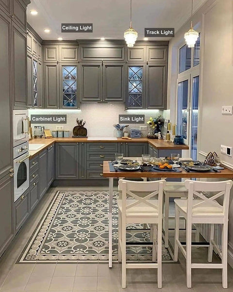 Modern kitchen with ceiling, track, and cabinet lights showcasing Six Pack PAR20 Flood 39W 120V Halogen Bulbs, Warm White 2700K.