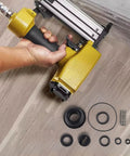 Heavy Duty Pneumatic Nailer Seal Kit For F30 T50 T64 P625 Air Stapler Repair with rubber seals and steel fittings laid out.