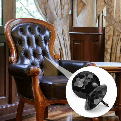 Solid 12 Pack Iron Clavos 1.5 Inches Long Featuring Gritty Hammered Black Finish on leather armchair detail.