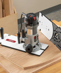 Heavy Duty Flush Trim Router Base Plate Shreds Through Tight Edge Banding Trim Without Breaking A Sweat mounted on wood with trimmer.