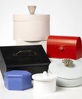 Assorted painted craft boxes showing results of Spray On Crystal Clear Acrylic Sealer For Crafts 12 Oz Gloss Finish That Dries Quick Non Yellowing